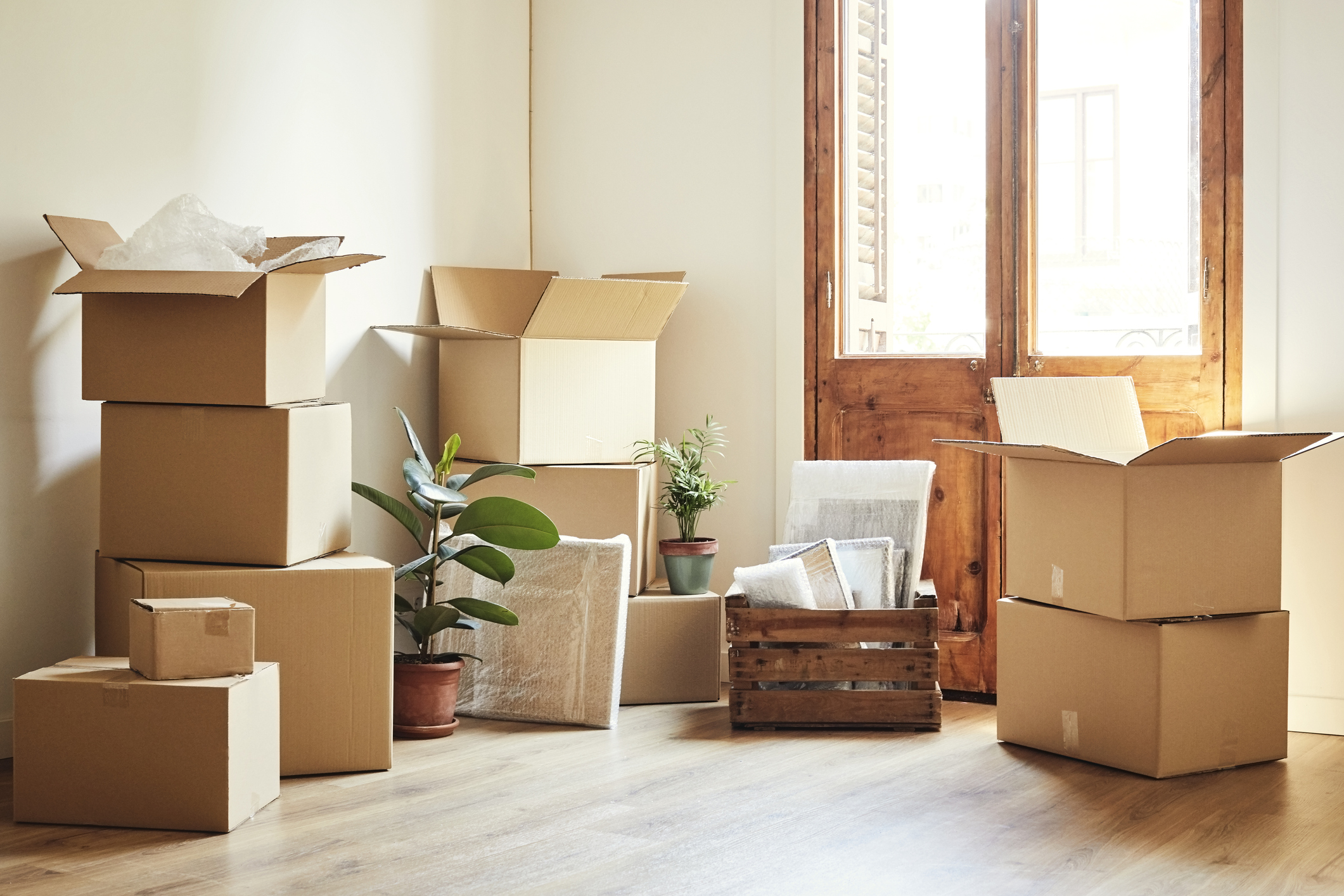 Moving boxes before Merry Maids move-out cleaning services