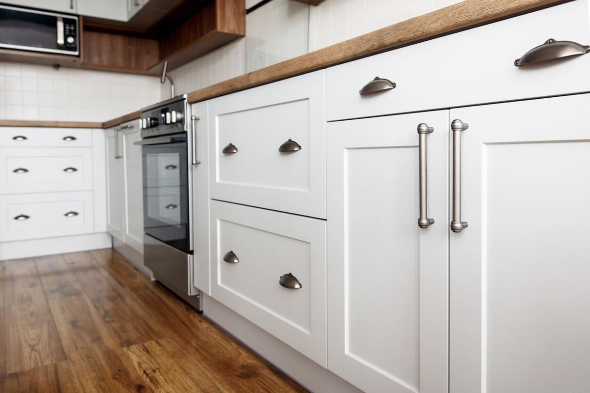 A close-up of cabinets and hardware in a kitchen after deep cleaning services in Mountain View, California