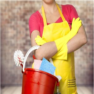 Woman with cleaning supplies