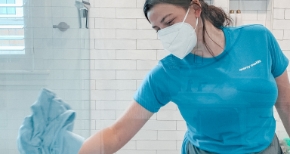 Merry Maids professional cleaning shower during house cleaning service