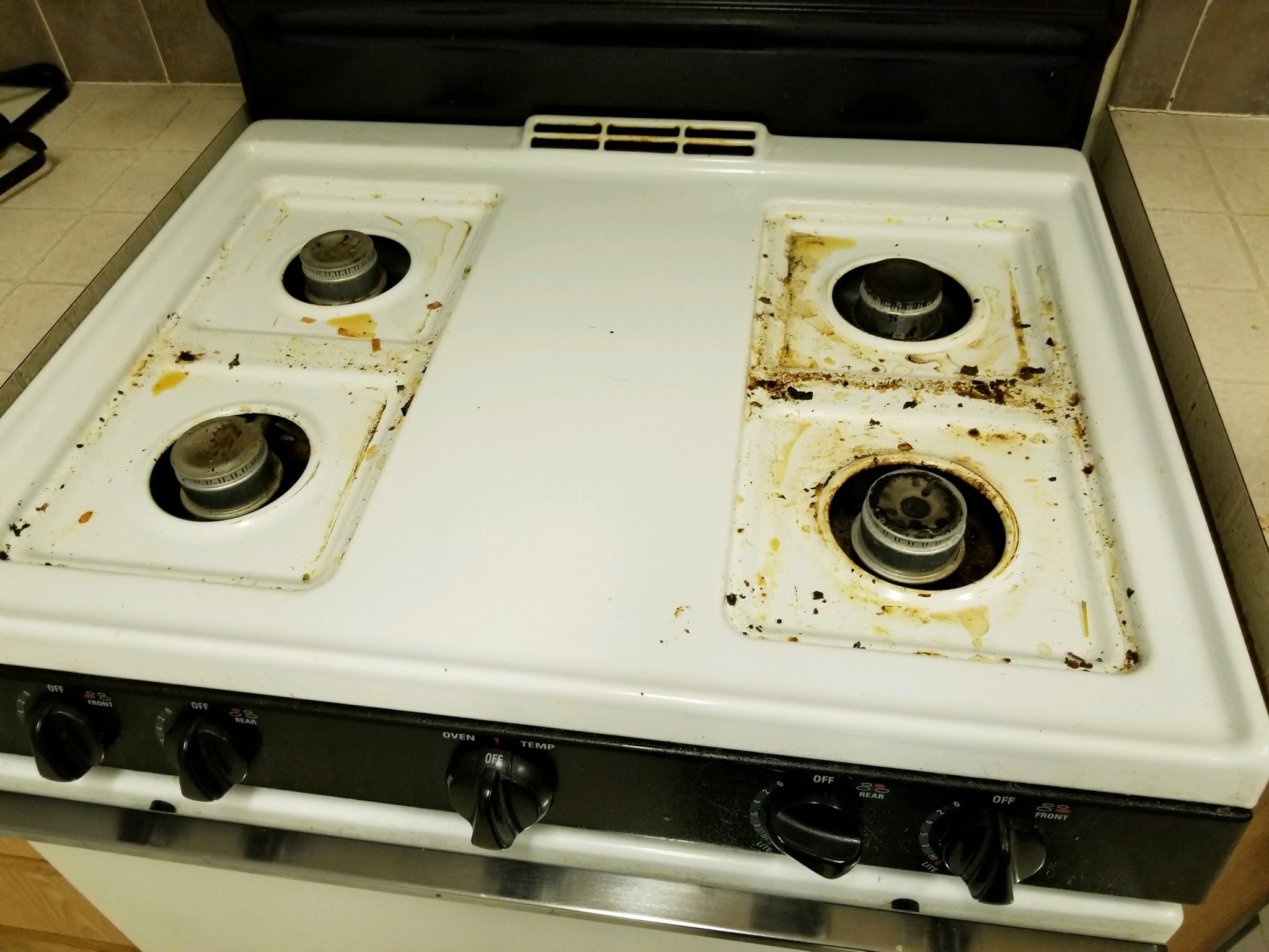 stove top before being cleaned